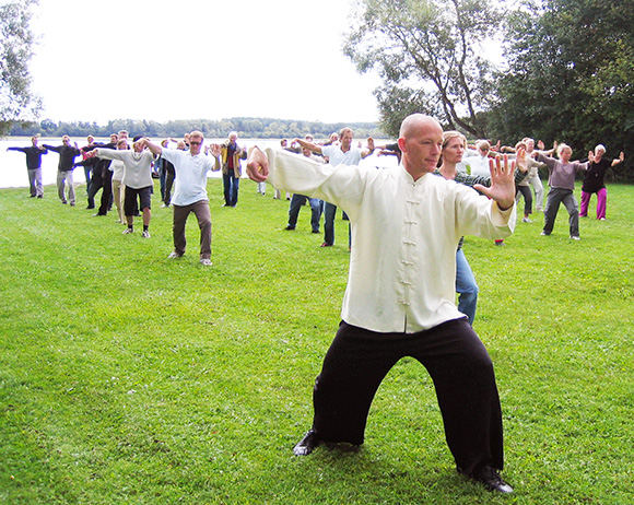 The staff at a Danish establishment having a field day in company with Tai Chi